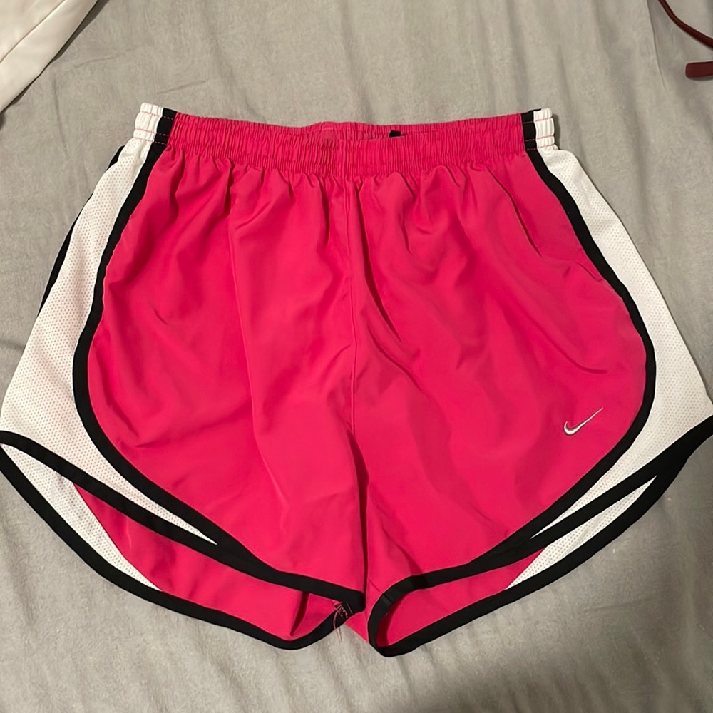 Pink Nike dri-fit running shorts